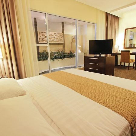 Harmoni One Convention Hotel And Service Apartments Batam Quarto foto