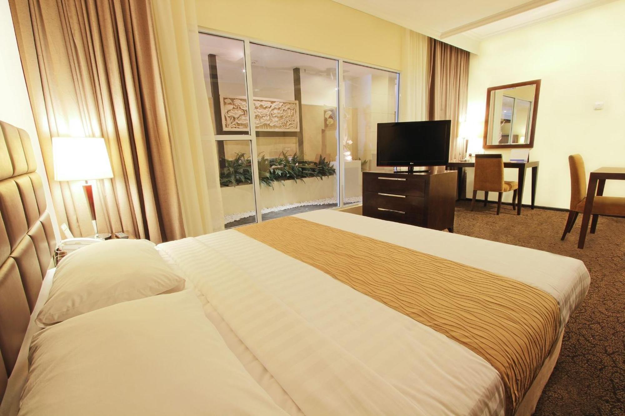 Harmoni One Convention Hotel And Service Apartments Batam Quarto foto
